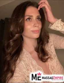 damla slender escort with brown hair and green eyes bodrum turkey